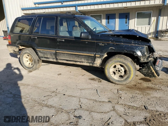 1994 Jeep Grand Cherokee Limited with VIN 1J4GZ78S0RC357283, listed as a Copart auction lot 49236995 with 84,306 mi miles and Salvage title. Bid and sale history available at DreamBid. Image 4.