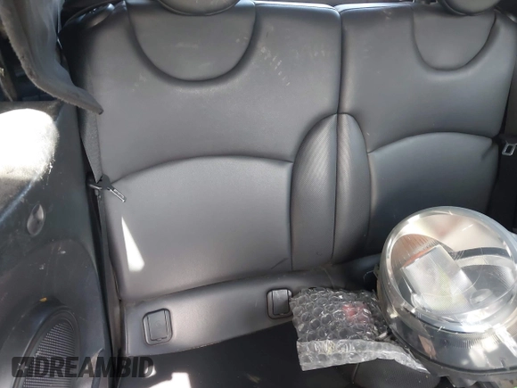 2013 MINI Convertible with VIN WMWZN3C58DT135598, listed as a IAAI auction lot 42122817 with 120,638 mi miles and . Bid and sale history available at DreamBid. Image 8.
