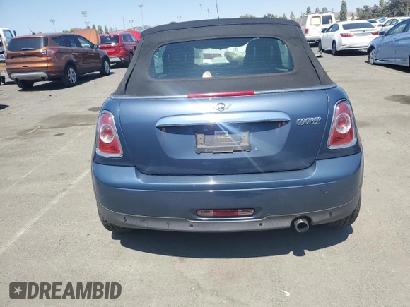 2011 MINI Convertible z VIN WMWZN3C56BTZ78387, wystawiony jako Copart lot #65002185 z przebiegiem 147 901 mil mil oraz Czysty tytuł • Clean title. Historia ofert i sprzedaży dostępna na DreamBid. Obrazek 6.