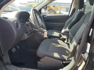 2010 Jeep Compass Sport with VIN 1J4NF4FB2AD591523, listed as a Copart auction lot 48809775 with 105,720 mi miles and Salvage Title. Bid and sale history available at carsss.com. Image 7.