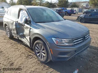 2018 Volkswagen Tiguan S with VIN 3VV0B7AX1JM123627, listed as a IAAI auction lot 41455998 with 92,950 mi miles. Bid and sale history available at carsss.com. Image 1.