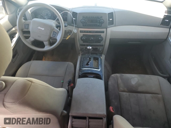 2005 Jeep Grand Cherokee Laredo with VIN 1J4GR48K05C625144, listed as a Copart auction lot 57477275 with 167,654 mi miles and Salvage title. Bid and sale history available at DreamBid. Image 8.