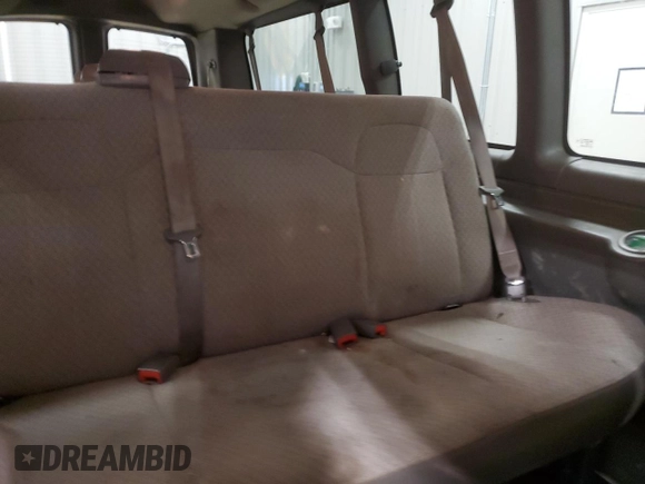 2014 Chevrolet Express Passenger LT with VIN 1GAZG1FG4E1176590, listed as a Copart auction lot 83660024 with 167,653 mi miles and Salvage title. Bid and sale history available at DreamBid. Image 12.