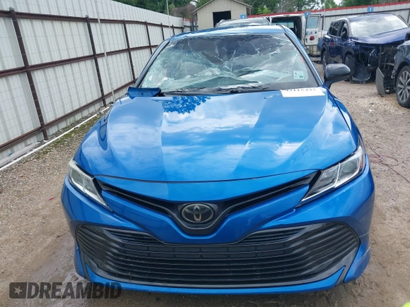 2019 Toyota Camry LE with VIN 4T1B11HK7KU259920, listed as a IAAI auction lot 42115493 with 69,254 mi miles and . Bid and sale history available at DreamBid. Image 12.