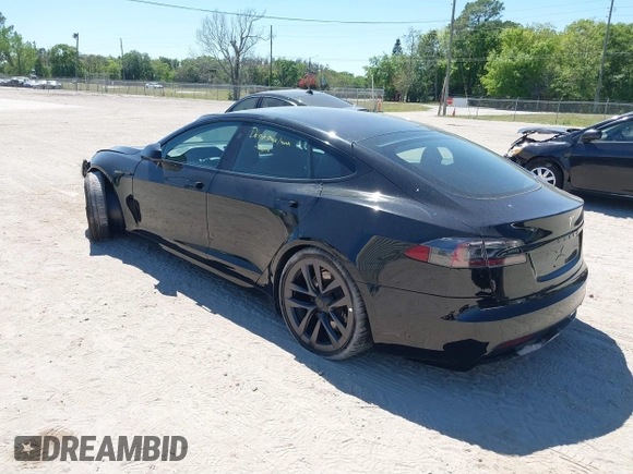 2021 Tesla Model S Plaid with VIN 5YJSA1E66MF452258, listed as a IAAI auction lot 41832000 with 42,845 mi miles and . Bid and sale history available at DreamBid. Image 3.