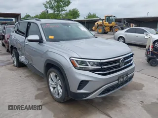2021 Volkswagen Atlas SE z VIN 1V2JR2CA2MC539992, wystawiony jako IAAI lot #42133933 z przebiegiem 82 287 mil mil oraz . Historia ofert i sprzedaży dostępna na DreamBid. Obrazek 1.
