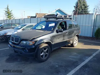 2005 BMW X5 3.0i with VIN 5UXFA13585LY10856, listed as a IAAI auction lot 41745279 with 153,748 mi miles. Bid and sale history available at carsss.com. Image 2.