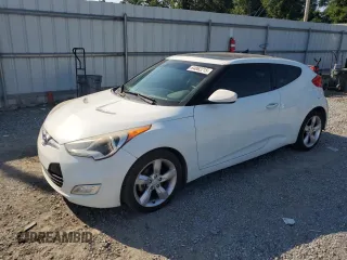 2013 Hyundai Veloster w/Red Int with VIN KMHTC6AD8DU147847, listed as a Copart auction lot 64862215 with 131,251 mi miles and Salvage title. Bid and sale history available at DreamBid. Image 1.
