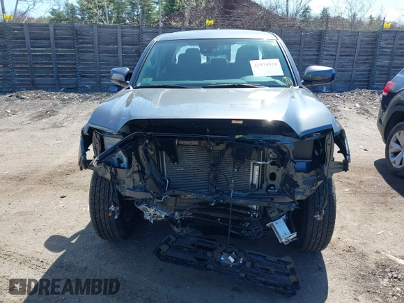 2023 Toyota Tacoma SR with VIN 3TMCZ5AN0PM614127, listed as a IAAI auction lot 41974924 with 12,674 mi miles and . Bid and sale history available at DreamBid. Image 13.