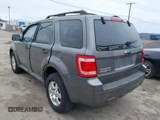 2009 Ford Escape XLT with VIN 1FMCU03G59KB04202, listed as a IAAI auction lot 41919819 with 111,730 mi miles. Bid and sale history available at carsss.com. Image 3.