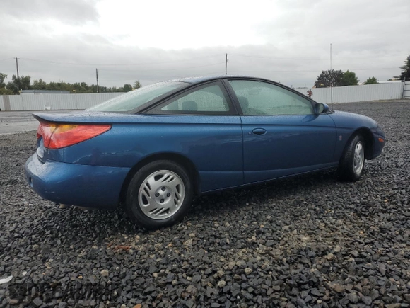 2001 Saturn SC z VIN 1G8ZR12791Z118164, wystawiony jako Copart lot #74393904 z przebiegiem 158 308 mil mil oraz Szkoda całkowita • Salvage title. Historia ofert i sprzedaży dostępna na DreamBid. Obrazek 3.
