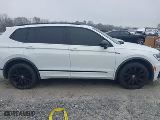 2020 Volkswagen Tiguan SE with VIN 3VV2B7AX1LM151388, listed as a IAAI auction lot 41480146 with 154,567 mi miles. Bid and sale history available at carsss.com. Image 13.