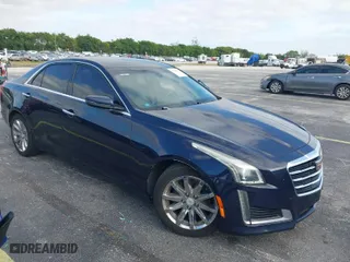 2016 Cadillac CTS Sedan RWD with VIN 1G6AP5SX8G0119984, listed as a IAAI auction lot 42098257 with 98,593 mi miles. Bid and sale history available at carsss.com. Image 1.