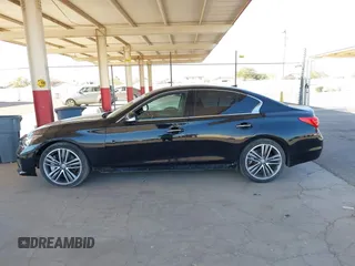 2014 Infiniti Q50 Premium with VIN JN1BV7AP9EM688811, listed as a IAAI auction lot 41483058 with 95,204 mi miles and . Bid and sale history available at DreamBid. Image 14.