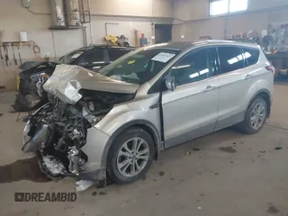 2017 Ford Escape SE z VIN 1FMCU0GD0HUC93439, wystawiony jako IAAI lot #41447523 z przebiegiem 94 776 mil mil oraz . Historia ofert i sprzedaży dostępna na DreamBid. Obrazek 17.