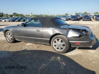 2003 Ford Thunderbird Deluxe z VIN 1FAHP60A63Y107026, wystawiony jako Copart lot #70650964 z przebiegiem 36 115 mil mil oraz Szkoda całkowita • Salvage title. Historia ofert i sprzedaży dostępna na DreamBid. Obrazek 2.