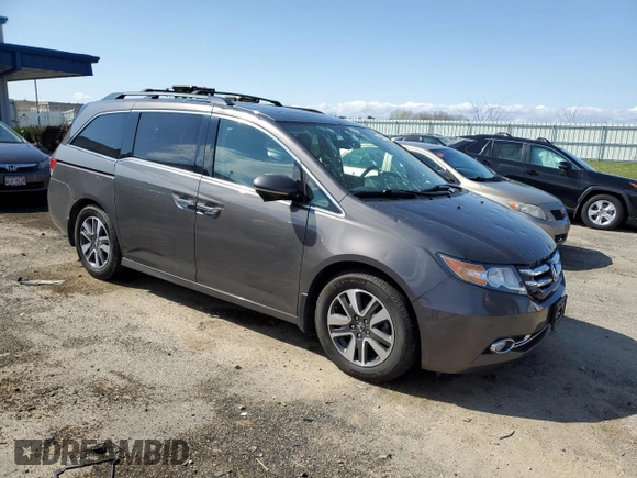 2017 Honda Odyssey Touring with VIN 5FNRL5H91HB013660, listed as a Copart auction lot 54246815 with 79,501 mi miles and Clean title. Bid and sale history available at DreamBid. Image 4.