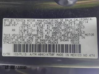 2014 Toyota Tacoma with VIN 3TMLU4EN1EM148353, listed as a IAAI auction lot 41602756 with 89,563 mi miles. Bid and sale history available at carsss.com. Image 9.