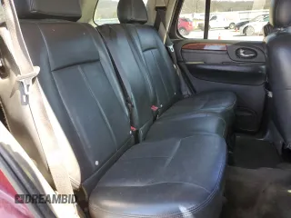 2006 GMC Envoy SLE z VIN 1GKDT13S262210046, wystawiony jako Copart lot #49335595 z przebiegiem 292 940 mil mil oraz Szkoda całkowita • Salvage title. Historia ofert i sprzedaży dostępna na DreamBid. Obrazek 11.