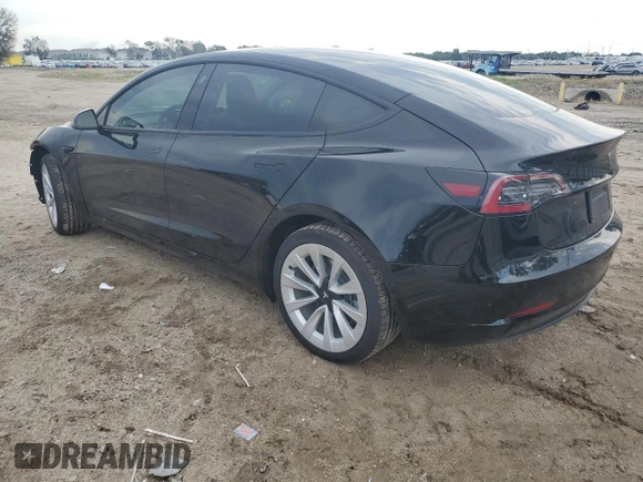 2022 Tesla Model 3 Long Range with VIN 5YJ3E1EB1NF243484, listed as a Copart auction lot 70745404 with 25,970 mi miles and Salvage Title. Bid and sale history available at DreamBid. Image 2.