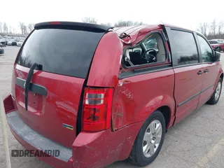 2008 Dodge Grand Caravan SE with VIN 1D8HN44H08B191755, listed as a IAAI auction lot 41895632 with 99,475 mi miles and . Bid and sale history available at DreamBid. Image 12.