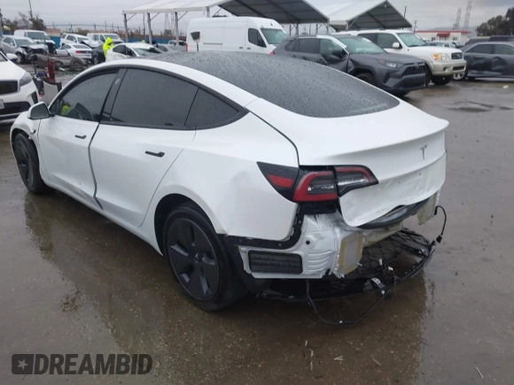 2023 Tesla Model 3 with VIN 5YJ3E1EA8PF578199, listed as a IAAI auction lot 41735465 with 50,823 mi miles and . Bid and sale history available at DreamBid. Image 3.