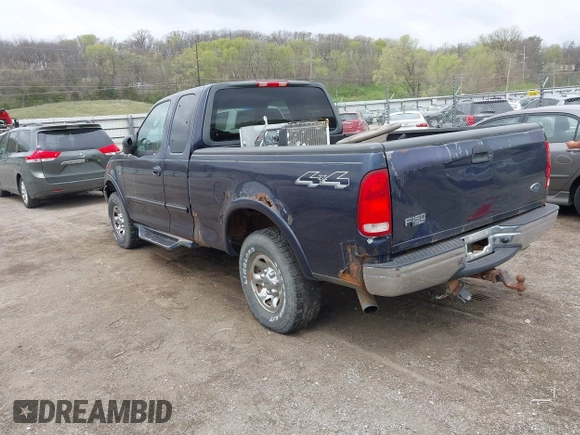 2002 Ford F-150 XL with VIN 2FTPX18L32CA67220, listed as a IAAI auction lot 42077154 with 233,409 mi miles. Bid and sale history available at carsss.com. Image 3.