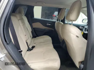 2016 Jeep Cherokee Latitude z VIN 1C4PJMCS1GW255747, wystawiony jako Copart lot #61195425 z przebiegiem 63 484 mil mil oraz Szkoda całkowita • Salvage title. Historia ofert i sprzedaży dostępna na DreamBid. Obrazek 11.