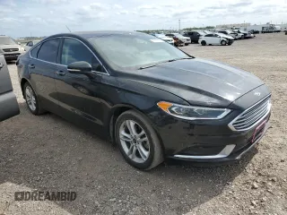 2018 Ford Fusion SE z VIN 3FA6P0HD8JR217719, wystawiony jako Copart lot #53429555 z przebiegiem 108 953 mil mil oraz Szkoda całkowita • Salvage title. Historia ofert i sprzedaży dostępna na DreamBid. Obrazek 4.