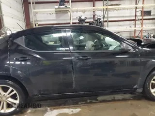 2014 Dodge Avenger SE z VIN 1C3CDZABXEN110977, wystawiony jako IAAI lot #41954638 z przebiegiem 206 912 mil mil oraz . Historia ofert i sprzedaży dostępna na DreamBid. Obrazek 13.