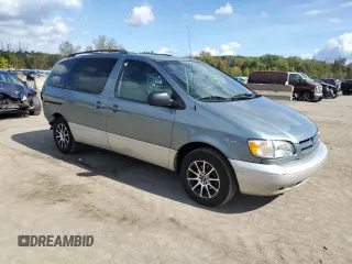 2000 Toyota Sienna LE with VIN 4T3ZF13C2YU286474, listed as a Copart auction lot 74230384 with 118,988 mi miles and Salvage Title. Bid and sale history available at carsss.com. Image 4.