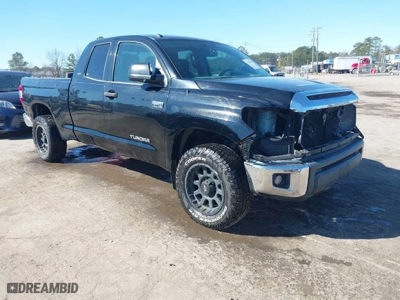 2015 Toyota Tundra 4WD Truck SR with VIN 5TFUW5F18FX437872, listed as a IAAI auction lot 41483349 with 276,068 mi miles. Bid and sale history available at carsss.com. Image 1.