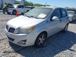 2009 Pontiac G3 with VIN KL2TD66E09B669915, listed as a IAAI auction lot 42046552 with 187,561 mi miles and . Bid and sale history available at DreamBid. Image 2.