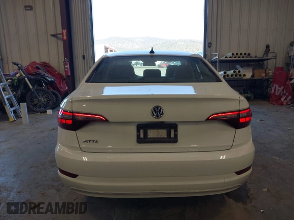 2021 Volkswagen Jetta S z VIN 3VWC57BU5MM046236, wystawiony jako IAAI lot #41740297 z przebiegiem 57 769 mil mil oraz . Historia ofert i sprzedaży dostępna na DreamBid. Obrazek 17.