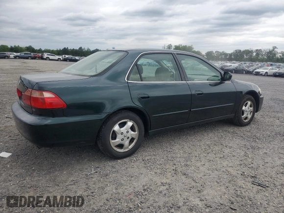 2000 Honda Accord EX z VIN 1HGCG6674YA001515, wystawiony jako Copart lot #56257935 z przebiegiem 215 030 mil mil oraz Czysty tytuł • Clean title. Historia ofert i sprzedaży dostępna na DreamBid. Obrazek 3.