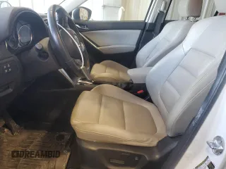 2015 Mazda CX-5 Grand Touring with VIN JM3KE4DY5F0538016, listed as a Copart auction lot 52396685 with 137,272 mi miles and Clean Title. Bid and sale history available at carsss.com. Image 7.