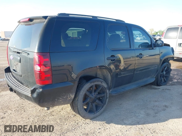 2007 Chevrolet Tahoe LS with VIN 1GNFC13CX7R406202, listed as a IAAI auction lot 41951878 with 181,571 mi miles and . Bid and sale history available at DreamBid. Image 4.