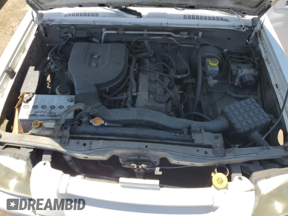 2003 Nissan Frontier XE with VIN 1N6DD26T73C425850, listed as a Copart auction lot 63330345 with 246,140 mi miles and Salvage title. Bid and sale history available at DreamBid. Image 11.