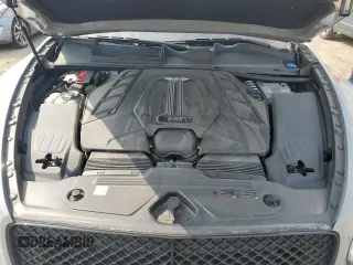 2022 Bentley Bentayga V8 z VIN SJAAM2ZVXNC013736, wystawiony jako Copart lot #67453664 z przebiegiem 22 660 mil mil oraz Nie do naprawy. Historia ofert i sprzedaży dostępna na DreamBid. Obrazek 11.