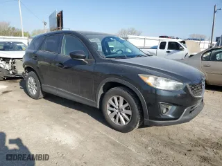2015 Mazda CX-5 Touring with VIN JM3KE2CY3F0435750, listed as a Copart auction lot 51734285 with 186,978 mi miles and Salvage Title. Bid and sale history available at carsss.com. Image 4.