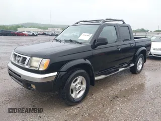 2000 Nissan Frontier XE z VIN 1N6ED27Y4YC355942, wystawiony jako IAAI lot #42162996 z przebiegiem 278 251 mil mil oraz . Historia ofert i sprzedaży dostępna na DreamBid. Obrazek 2.
