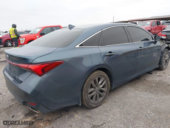 2022 Toyota Avalon XLE with VIN 4T1JZ1FB2NU073049, listed as a IAAI auction lot 41506550 with 52,073 mi miles. Bid and sale history available at carsss.com. Image 4.