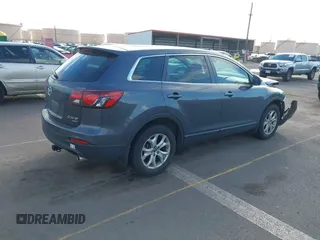 2014 Mazda CX-9 Sport with VIN JM3TB3BAXE0442006, listed as a IAAI auction lot 41430742 with 82,682 mi miles and . Bid and sale history available at DreamBid. Image 4.