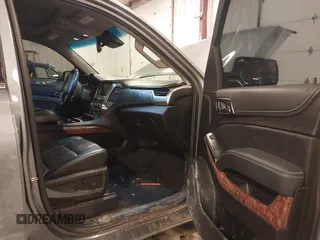 2019 Chevrolet Suburban Premier with VIN 1GNSKJKC1KR291629, listed as a IAAI auction lot 41565675 with 129,672 mi miles and . Bid and sale history available at DreamBid. Image 5.