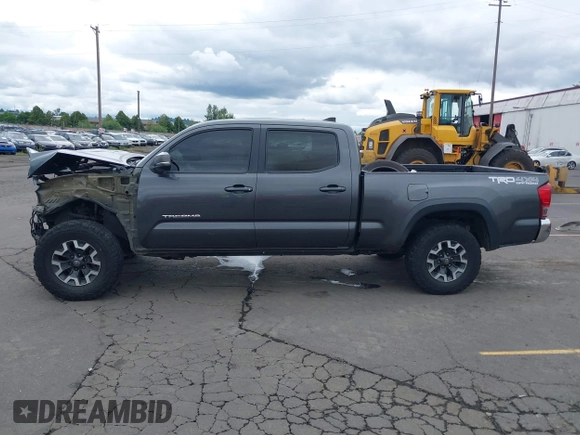 2017 Toyota Tacoma SR5 with VIN 3TMDZ5BN3HM027098, listed as a IAAI auction lot 42409977 with 97,224 mi miles and . Bid and sale history available at DreamBid. Image 15.