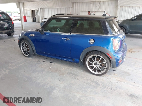 2007 MINI Hardtop S with VIN WMWMF73557TT86128, listed as a IAAI auction lot 42417311 with 114,911 mi miles and . Bid and sale history available at DreamBid. Image 3.