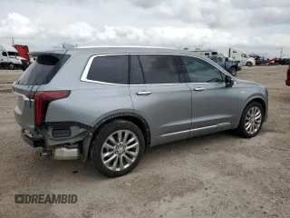 2024 Cadillac XT6 FWD Premium Luxury z VIN 1GYKPCRS2RZ741375, wystawiony jako Copart lot #54308865 z przebiegiem 9 932 mil mil oraz Szkoda całkowita • Salvage title. Historia ofert i sprzedaży dostępna na DreamBid. Obrazek 3.