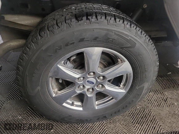 2018 Ford F-150 XL with VIN 1FTEW1EP1JKE55493, listed as a IAAI auction lot 42666714 with 104,452 mi miles and . Bid and sale history available at DreamBid. Image 2.