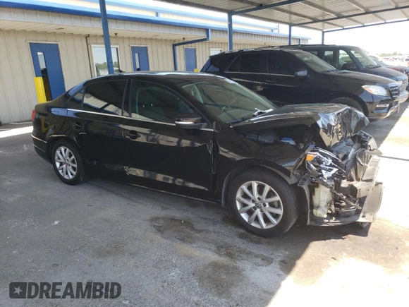 2014 Volkswagen Jetta SE with VIN 3VWD17AJXEM445488, listed as a Copart auction lot 65282425 with 159,356 mi miles and Salvage title. Bid and sale history available at DreamBid. Image 4.