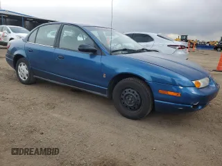 2001 Saturn SL z VIN 1G8ZH54811Z357837, wystawiony jako Copart lot #55210895 z przebiegiem 217 799 mil mil oraz Nie do naprawy. Historia ofert i sprzedaży dostępna na DreamBid. Obrazek 4.